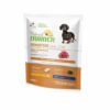 Natural Trainer Sensitive No Gluten Mini Adult con Agnello crocchette per cani adulti di taglia piccola create con ingredienti che favoriscono la digestione.